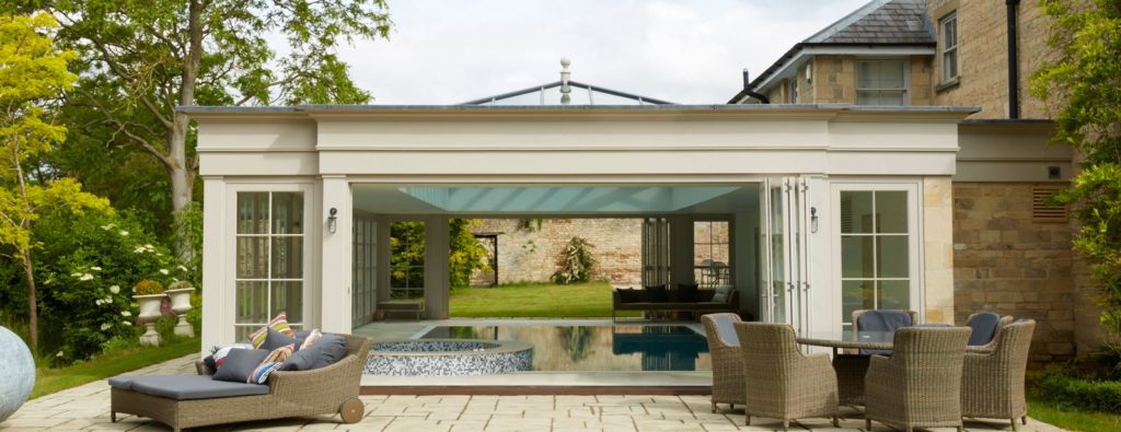 pool house with doors open